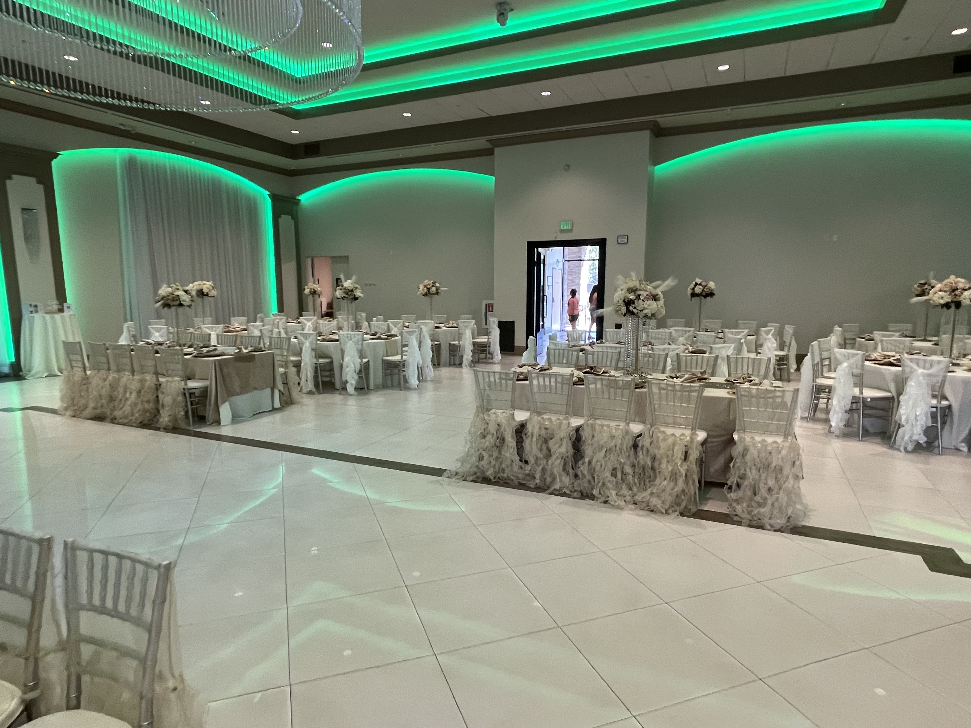 Wedding reception tables with uplighting