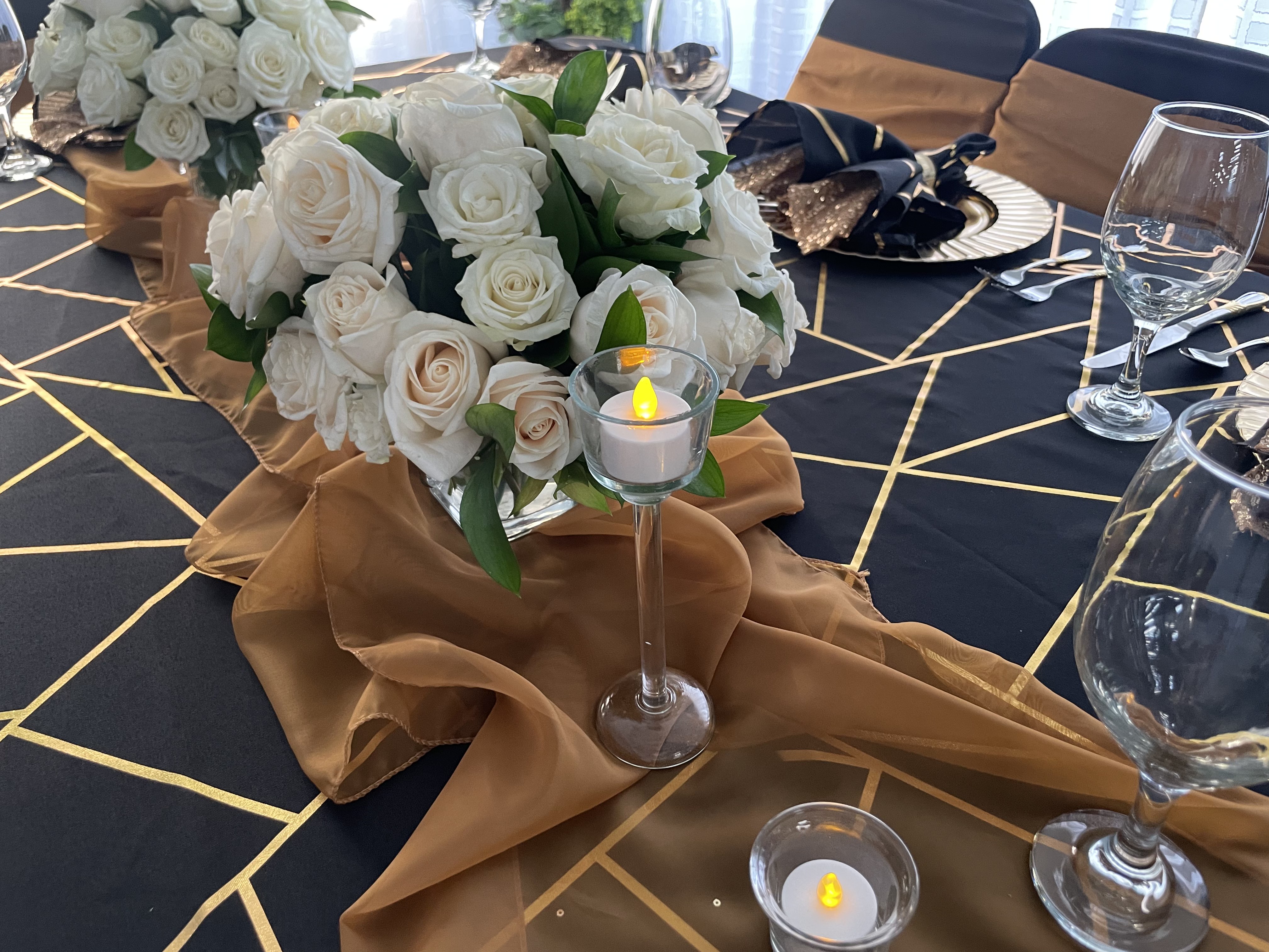Black and gold gala place setting