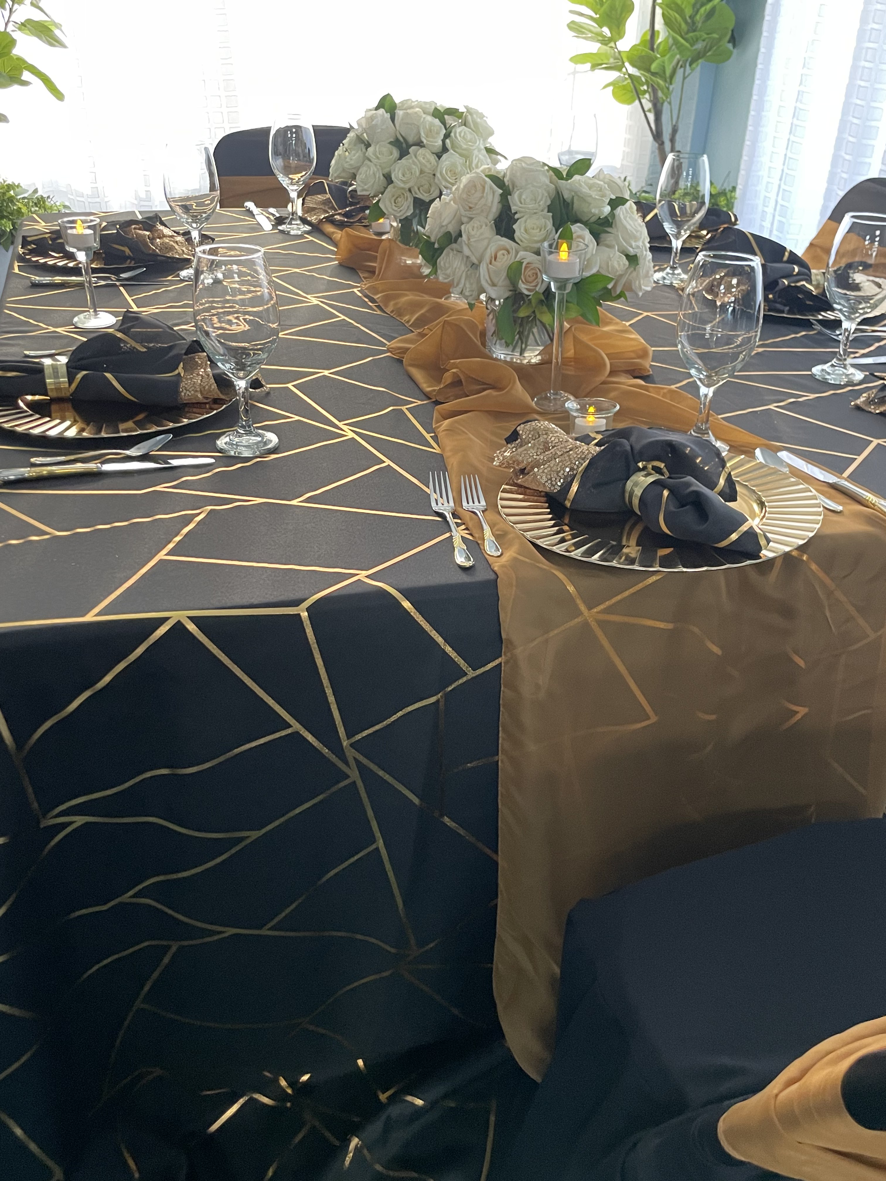 Black and gold gala tablescape
